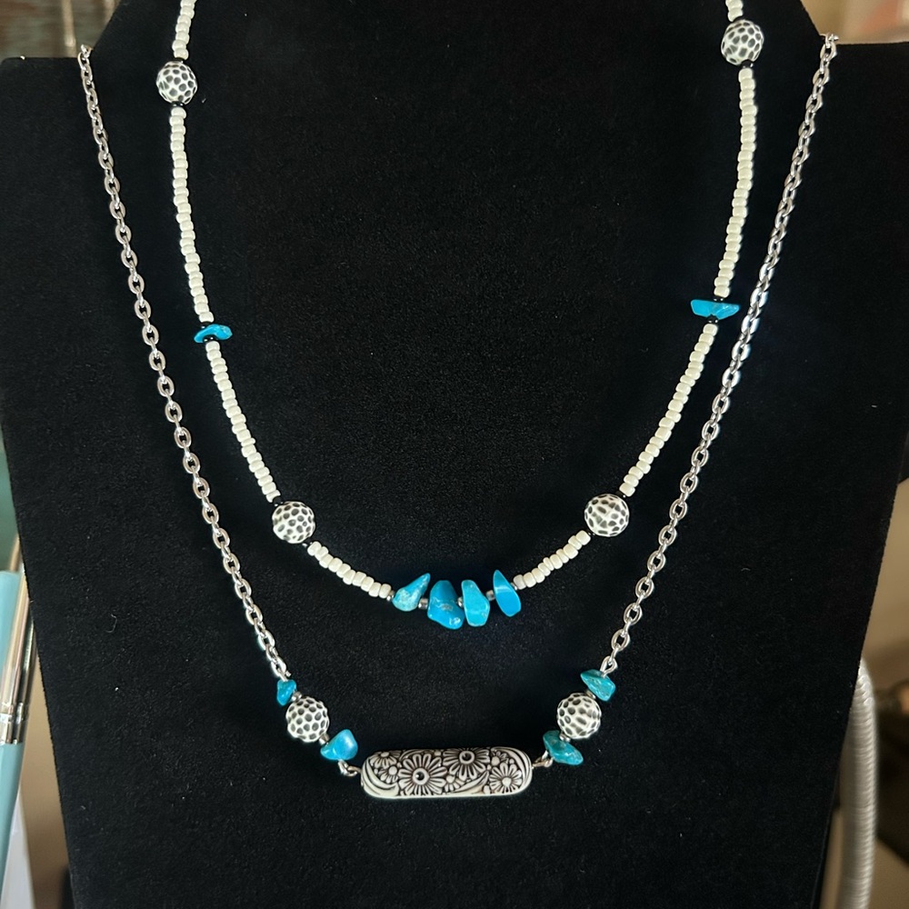 Boho cowgirl- White and black floral engraved bead necklaces.  🤠